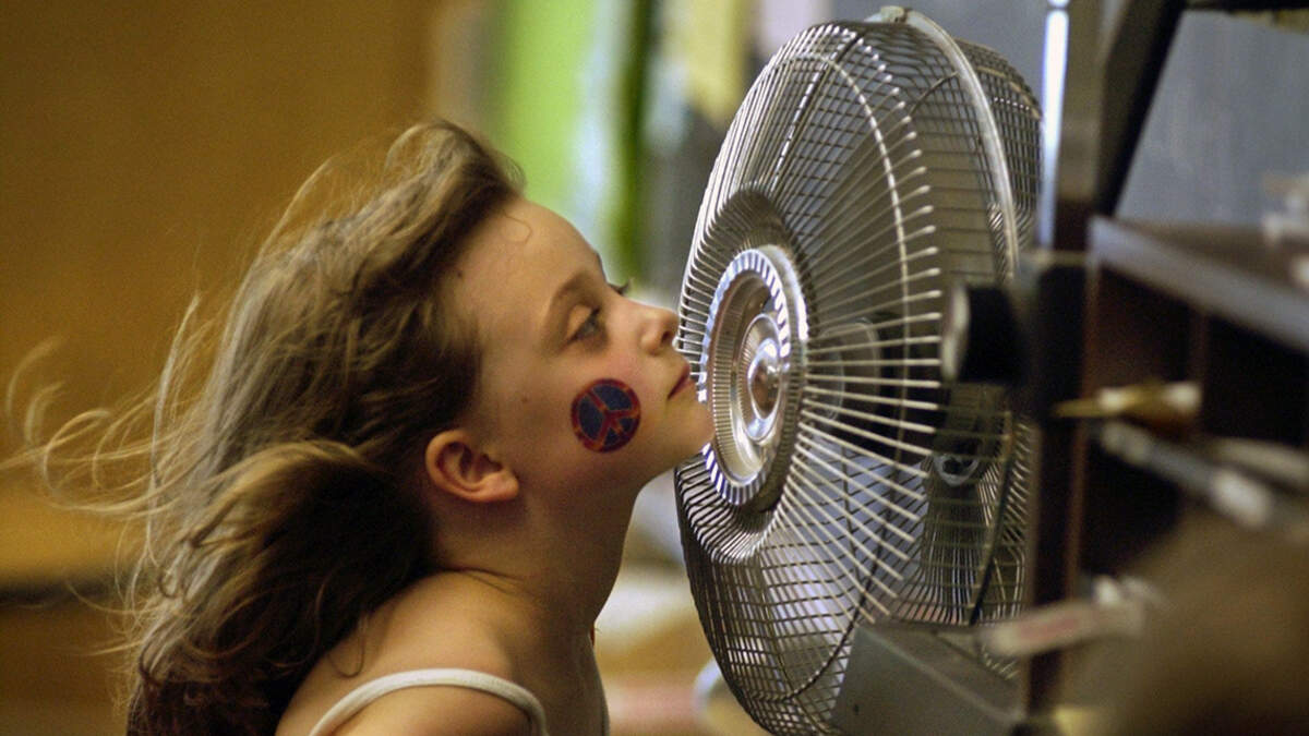 Why do classes need to be in session during the hottest part of the year?